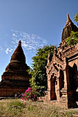 The cluster of red brick temples, named Khay-min-gha on the map on the North plain of Bagan. Myanmar. 